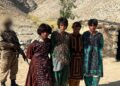 Militants caught fleeing in women’s disguise