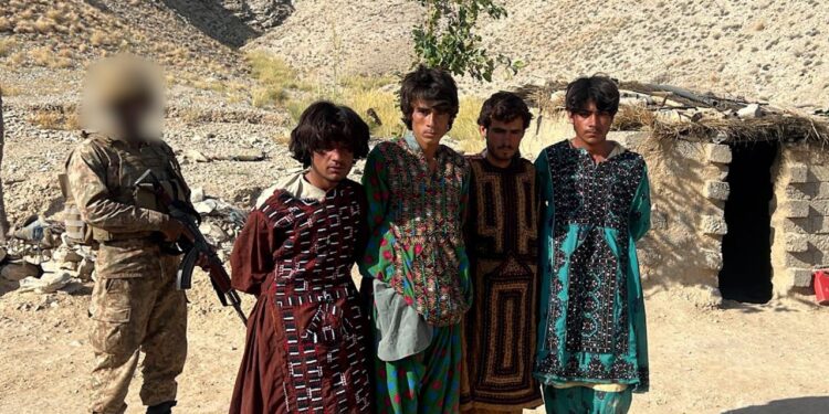 Militants caught fleeing in women’s disguise