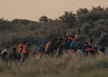 U.K. unveils new asylum rules: 20-year wait and asset seizures