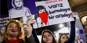 People hold placards as they attend a protest against femicide, sexual violence and all gender-based violence to mark the International Day for Elimination of Violence Against Women, in Istanbul on November 25. — Reuters
