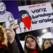 People hold placards as they attend a protest against femicide, sexual violence and all gender-based violence to mark the International Day for Elimination of Violence Against Women, in Istanbul on November 25. — Reuters