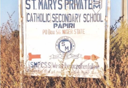PAPIRI (Nigeria): A sign directing people to St. Mary’s School, which was the site of the kidnapping of more than 300 children and staff a couple of days ago.—Reuters