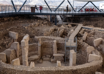 Tourists visit the Gobeklitepe excavation site, widely regarded with Karahantepe as keys to understanding the birth of symbolic thought, social complexity and monumental architecture thousands of years before cities or states existed, near the southeastern city of Sanliurfa, Turkey