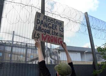 Demonstrators protest outside of Brook House Immigration Removal Centre against a planned deportation of asylum seekers from Britain to Rwanda, at Gatwick Airport near Crawley, Britain.— Reuters