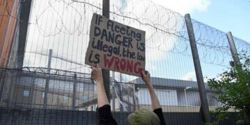 Demonstrators protest outside of Brook House Immigration Removal Centre against a planned deportation of asylum seekers from Britain to Rwanda, at Gatwick Airport near Crawley, Britain.— Reuters