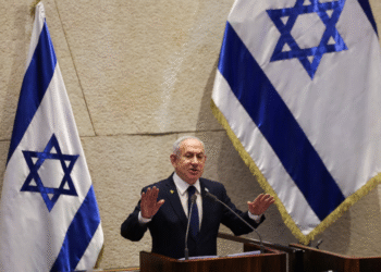 Israeli Prime Minister Benjamin Netanyahu speaks at the plenum of the Knesset, Israel's parliament, in Jerusalem, November 10, 2025. REUTERS