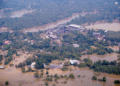 An aerial view of submerged buildings in a flooded area caused by heavy rainfall following Cyclone Ditwah in Niyamgamdora, Sri Lanka