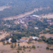 An aerial view of submerged buildings in a flooded area caused by heavy rainfall following Cyclone Ditwah in Niyamgamdora, Sri Lanka