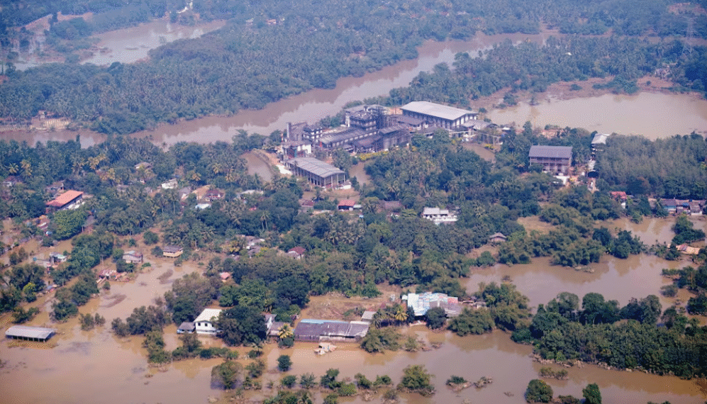 An aerial view of submerged buildings in a flooded area caused by heavy rainfall following Cyclone Ditwah in Niyamgamdora, Sri Lanka