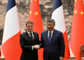 France President Emmanuel Macron (L) and Chinese President Xi Jinping (R) shake hands after a joint press conference at the Great Hall of the People in Beijing on December 4, 2025. – Reuters