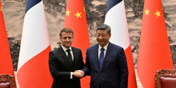 France President Emmanuel Macron (L) and Chinese President Xi Jinping (R) shake hands after a joint press conference at the Great Hall of the People in Beijing on December 4, 2025. – Reuters