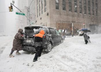 Winter storm claims dozens of lives as severe cold grips central, eastern US