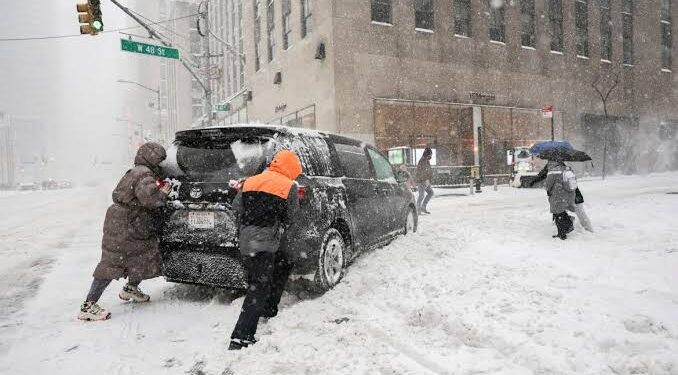 Winter storm claims dozens of lives as severe cold grips central, eastern US