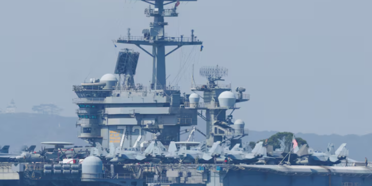 US shoots down Iranian drone approaching aircraft carrier, official says