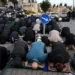 Eid Prayers Held Outside Jerusalem’s Old City as Israel Restricts Access to Al-Aqsa