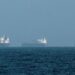 Three vessels hit by projectiles in Strait of Hormuz