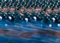 China’s Xi says the military must be politically loyal, root out corruption