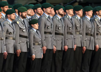 Germany works to clarify new rules on fighting-age men leaving country