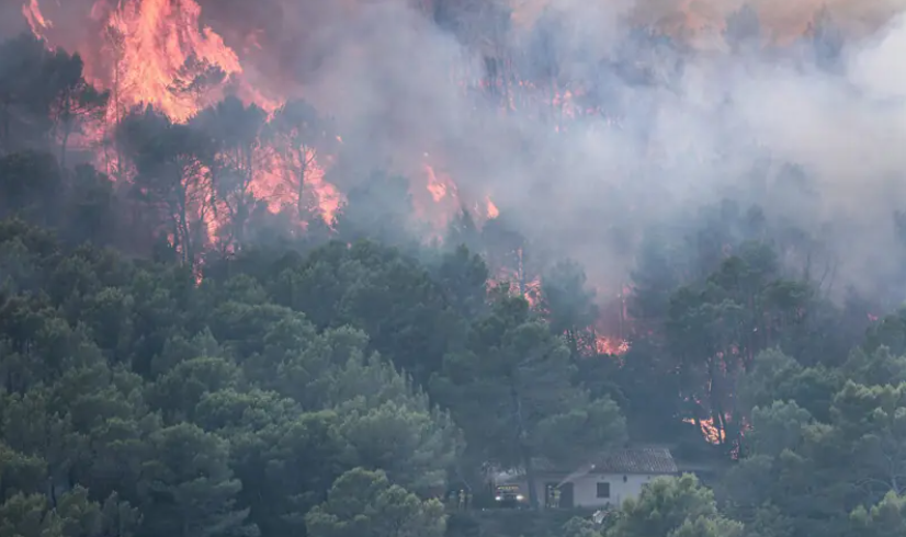 Wildfires across southern Europe kill firefighters, force thousands to evacuate
