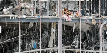 Japan earthquake death toll climbs to 13 as rescuers race to find survivors trapped in collapsed mall