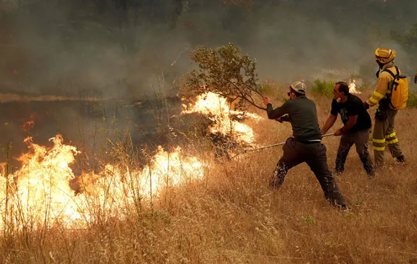 Over 100,000 evacuated as wildfires sweep across France and Spain