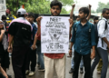 Modi announces exam reform panel after education minister resigns amid protests