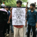 Modi announces exam reform panel after education minister resigns amid protests