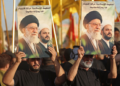Iran warns Gulf states against aiding US as UAE suspends economic ties